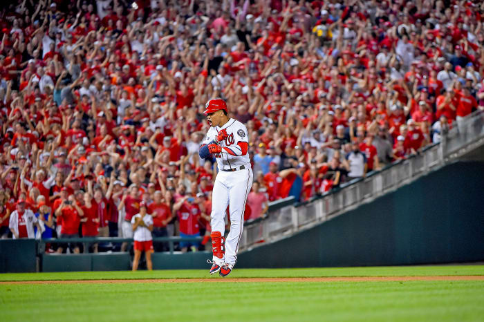 Juan Soto celebrates after hitting a three-run single off Brewers relief ace Josh Hader in the 2019 NL wild-card game.